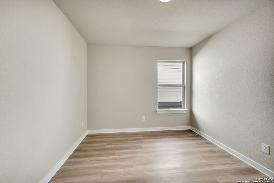 Spacious, unfurnished interior of a new home in Winding Brook, San Antonio (Image 29).