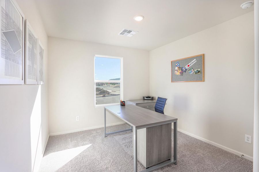 A room with a table and chairs. A room with a table and chairs.