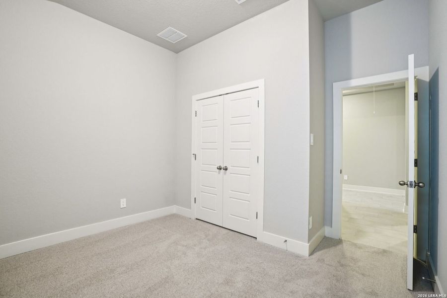 Spacious, unfurnished interior of a new home in Estancia Ranch - Classic Series, San Antonio (Image 19).