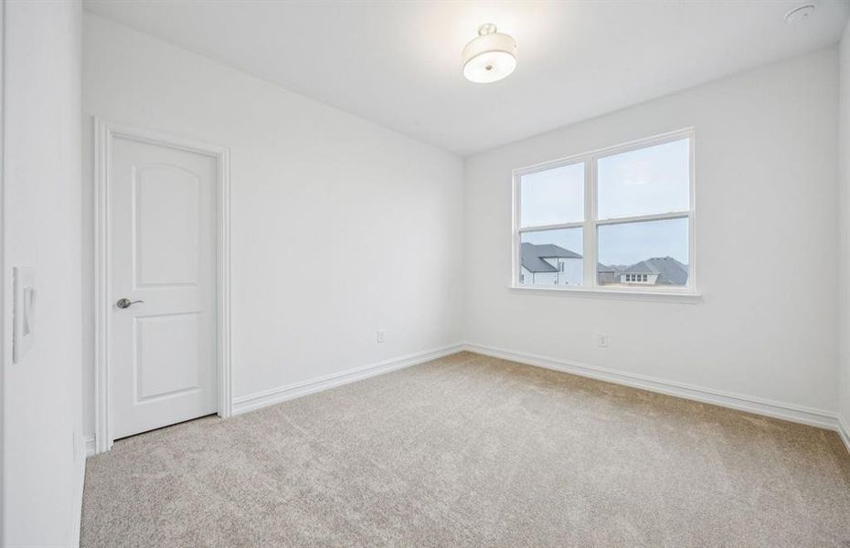 Secondary bedroom with ample closet space