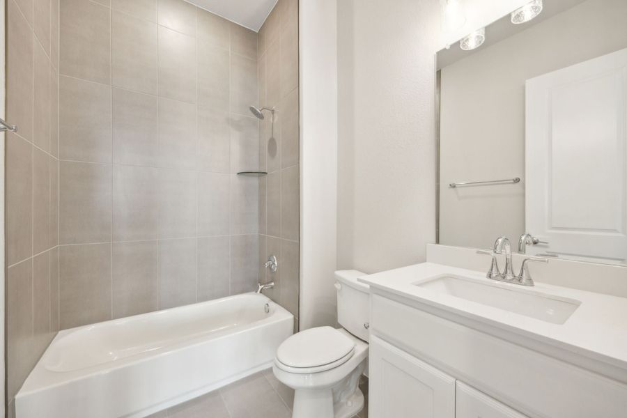 Furnished interior view inside a new home in Newman Village Townhomes, Frisco (Image 11).