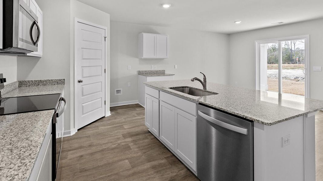 Furnished interior view inside a new home in Vineyard Trail, Jacksonville (Image 6).