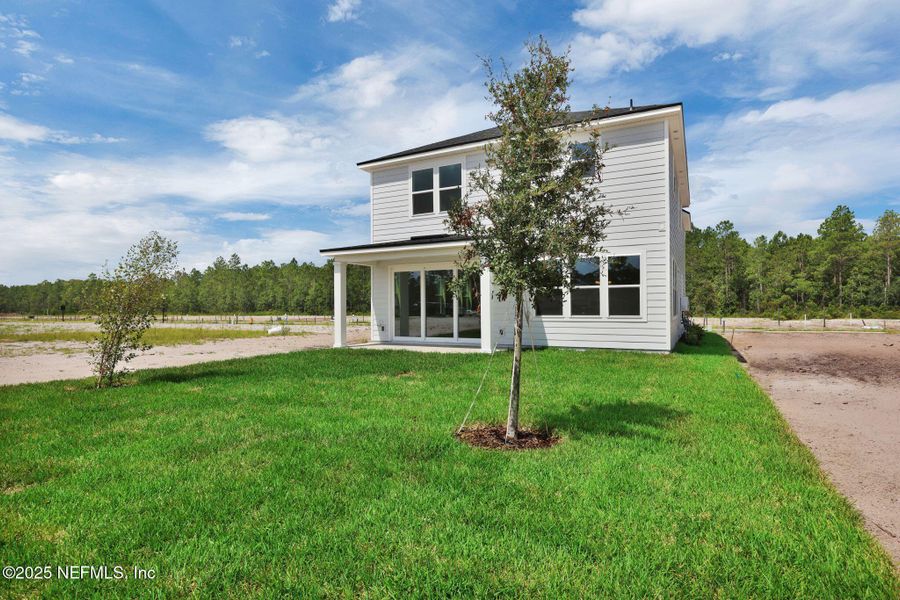 Exterior details and patio area of a home in Seabrook Village at Nocatee, Ponte Vedra (Image 22).