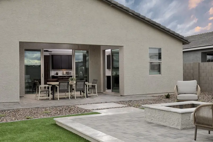 Covered patio - Sanctuary at Stonebridge Model Home. Finishes and options may vary by community
