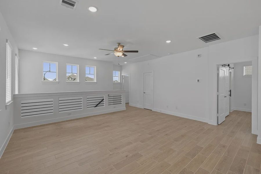 Spacious, unfurnished interior of a new home in Elyson Courtyard Collection, Katy (Image 19).