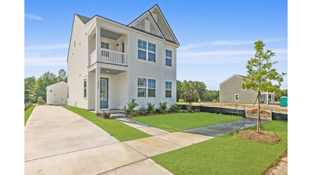 Front exterior of a new home in Sheep Island, Summerville, SC, highlighting curb appeal (Image 23).