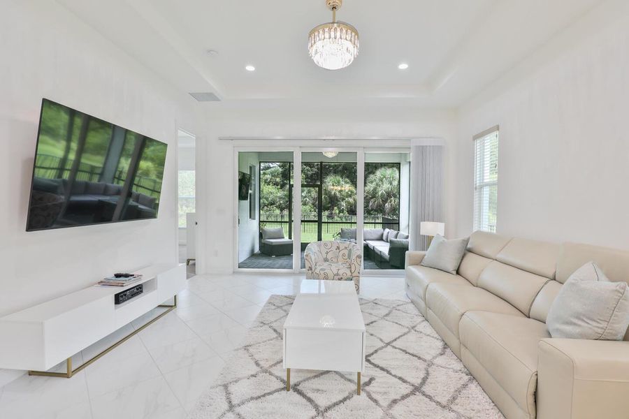 Furnished interior view inside a new home in PGA Village Verano, Port St. Lucie (Image 37).