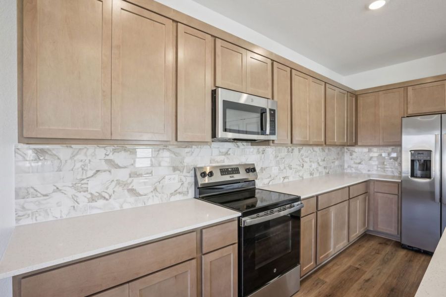 Furnished interior view inside a new home in Crosswinds, Kyle (Image 6).