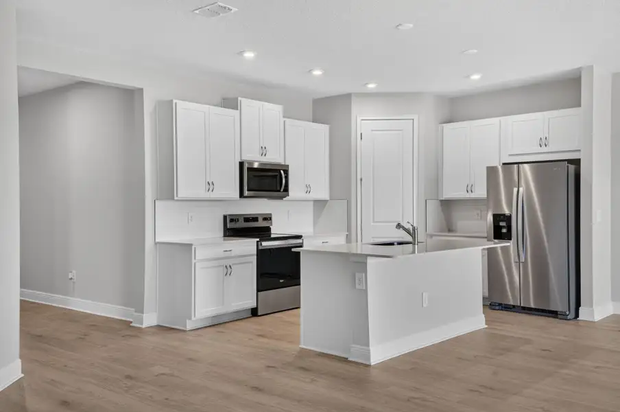 Furnished interior view inside a new home in Windwater, Parrish (Image 3).