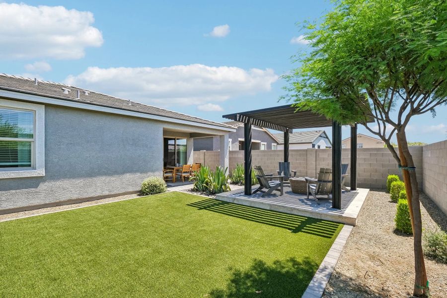 Back exterior elevation with full backyard landscaping Back exterior elevation with full backyard landscaping