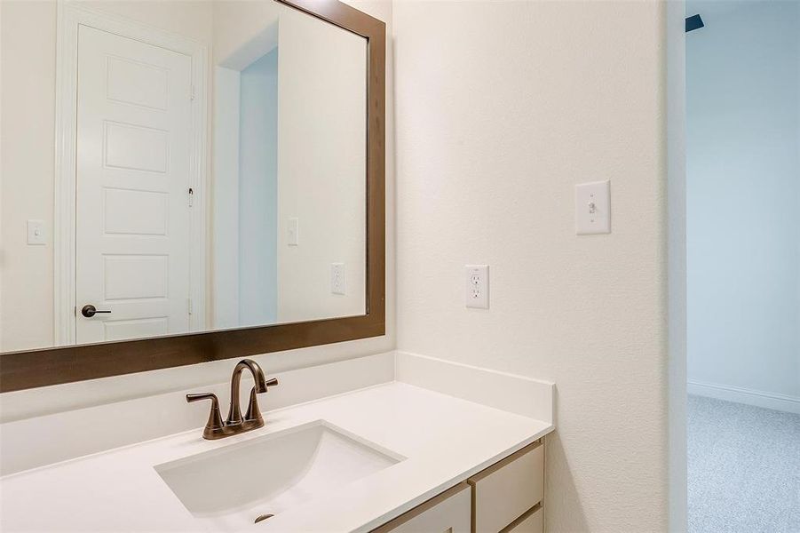 Bathroom featuring vanity