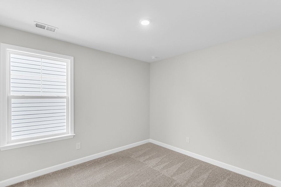 Spacious, unfurnished interior of a new home in Pineland Preserve, Summerville (Image 42).