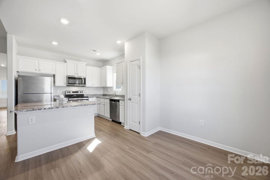 Furnished interior view inside a new home in Stagecoach Station, Gastonia (Image 7).
