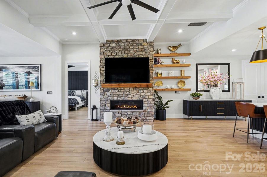 A striking modern fireplace serving as a focal point, blending clean lines and warm materials to create a cozy yet sophisticated atmosphere in the room.