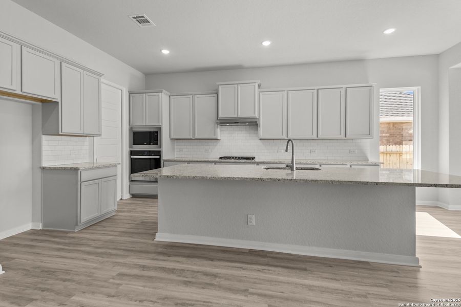 Furnished interior view inside a new home in Stillwater Ranch 60', San Antonio (Image 7).