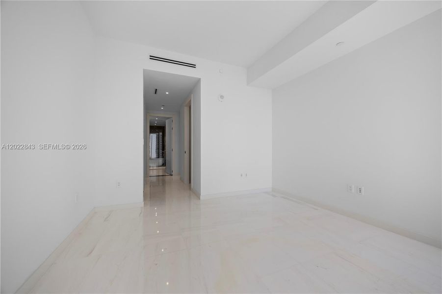 Spacious, unfurnished interior of a new home in Aston Martin Residences, Miami (Image 28).