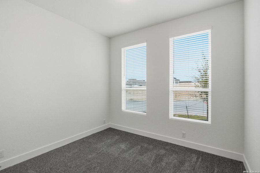 Spacious, unfurnished interior of a new home in Prominence, San Antonio (Image 30).