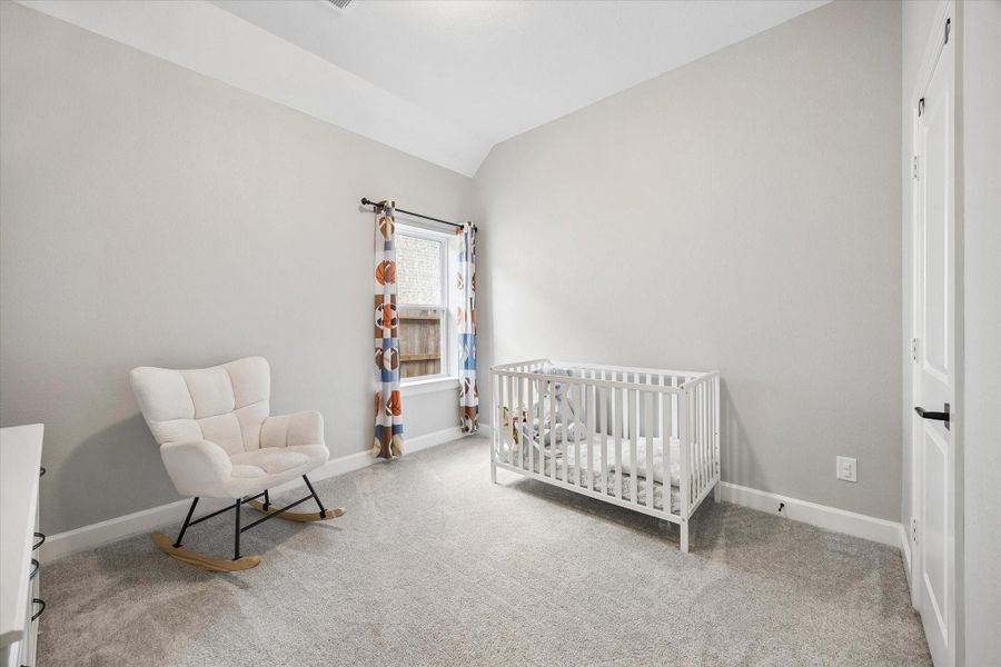Charming secondary bedroom featuring soft designer tones, elegant lighting, and generous space ideal for family or guests. Charming secondary bedroom featuring soft designer tones, elegant lighting, and generous space ideal for family or guests.