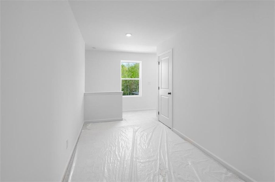 Spacious, unfurnished interior of a new home in Windance Lake, Loganville (Image 21).