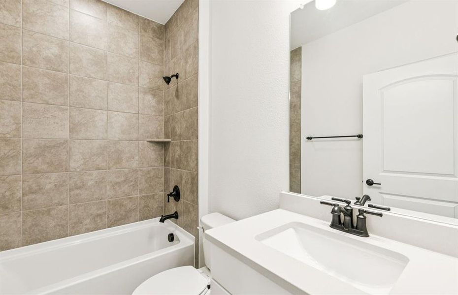 Secondary bathroom with premium finishes  *Real home pictured