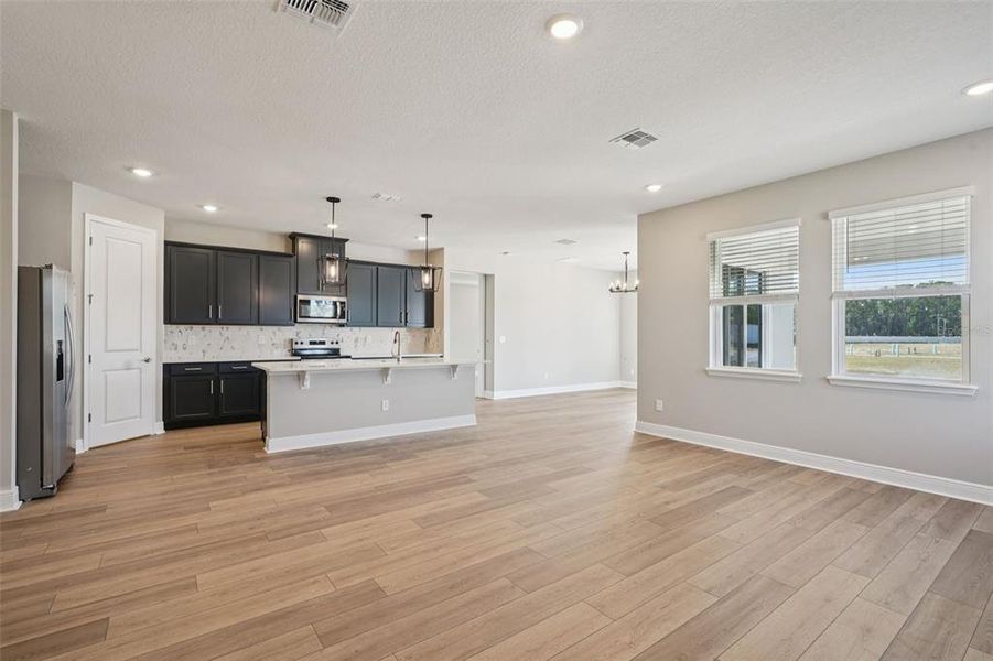 Spacious, unfurnished interior of a new home in Legends Preserve - Signature Series, Daytona Beach (Image 15). Spacious, unfurnished interior of a new home in Legends Preserve - Signature Series, Daytona Beach (Image 15).