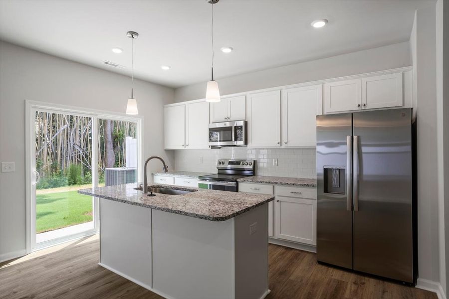 Furnished interior view inside a new home in West Main Townhomes, Sanford (Image 6).