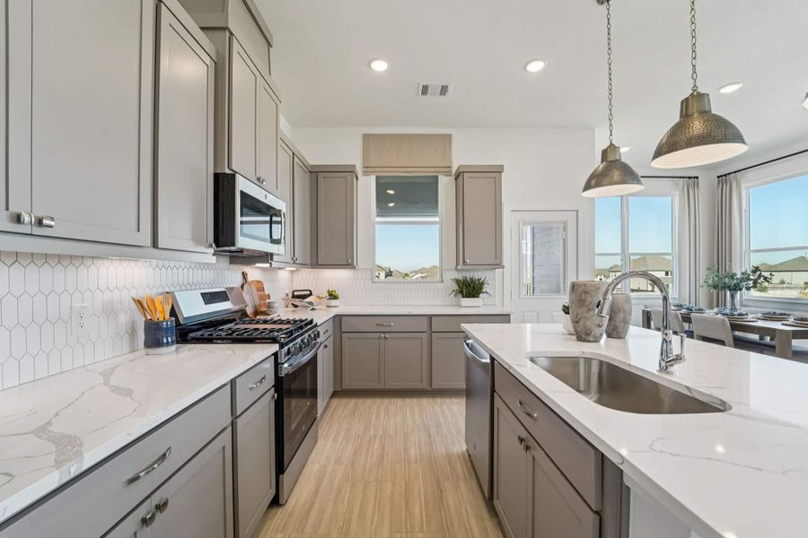 Representative furnished interior of a home built from the Margaux – Chateau Collection by Chesmar Homes in Bridgeland, Cypress (Image 8).