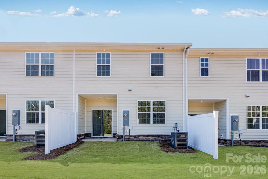 Exterior details and patio area of a home in Cannon Village, York (Image 3).