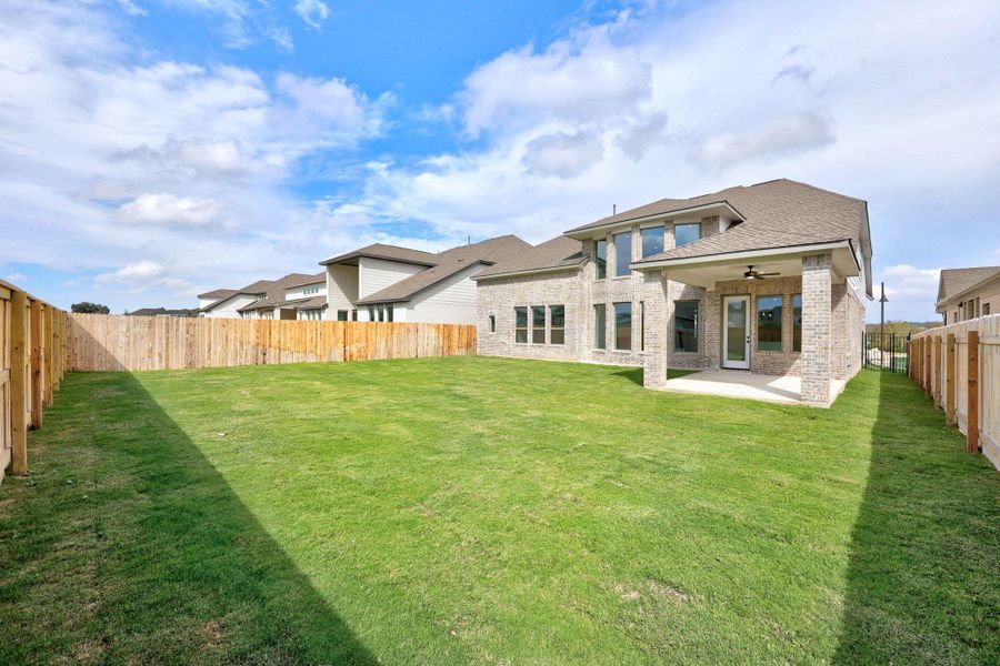 Exterior details and patio area of a home in Santa Rita Ranch - 60', Liberty Hill (Image 3). Exterior details and patio area of a home in Santa Rita Ranch - 60', Liberty Hill (Image 3).