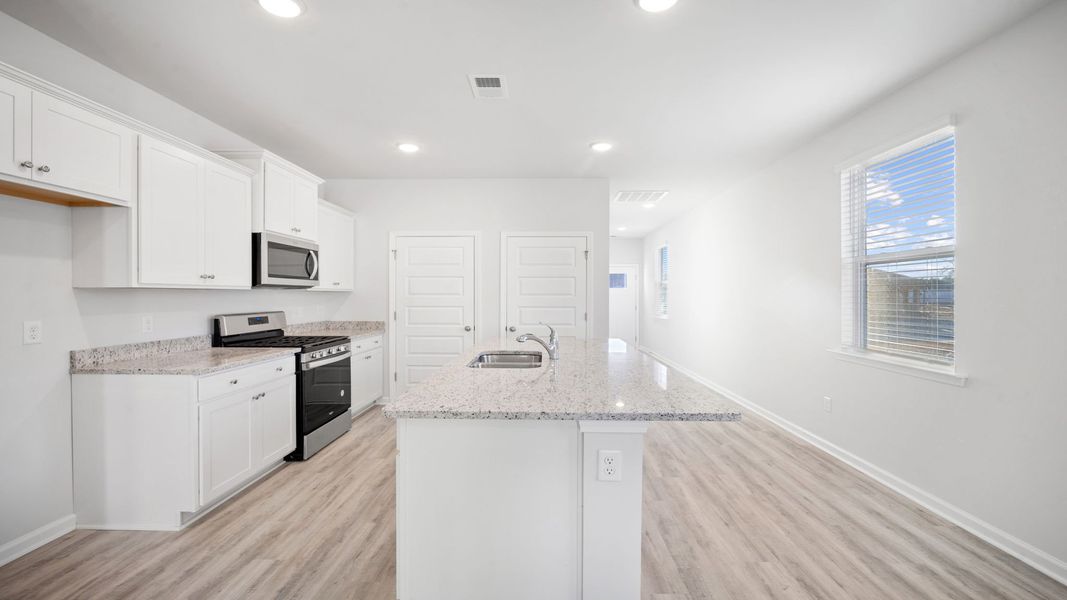 Furnished interior view inside a new home in Grand Oaks, Columbia (Image 6). Furnished interior view inside a new home in Grand Oaks, Columbia (Image 6).