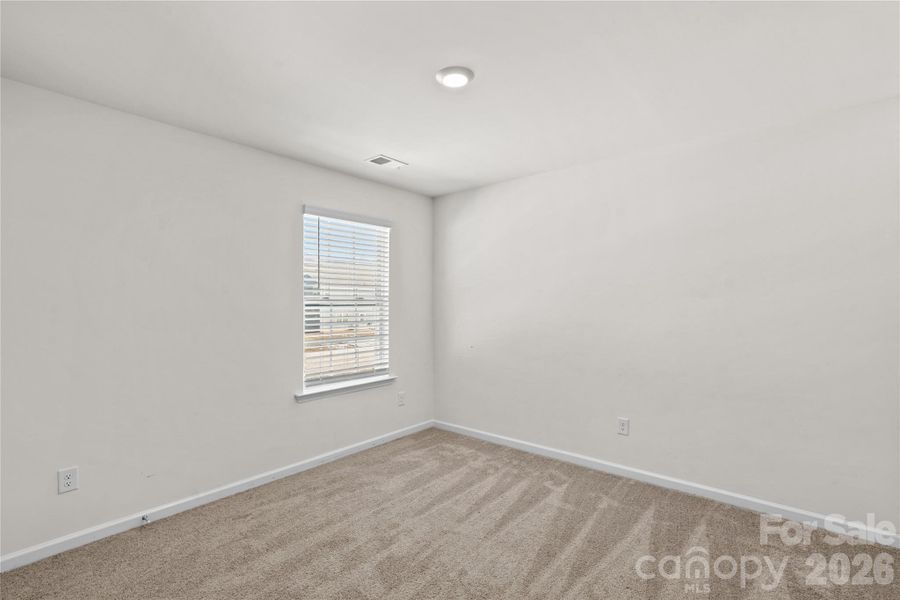 Spacious, unfurnished interior of a new home in Wallace Springs, Statesville (Image 35).