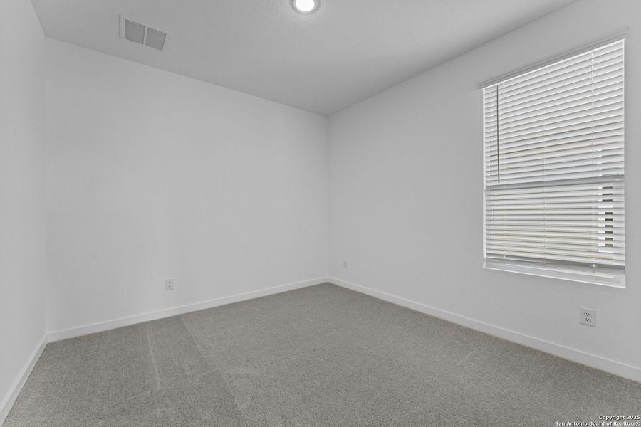 Spacious, unfurnished interior of a new home in Waterwheel: Coastline Collection, San Antonio (Image 23).