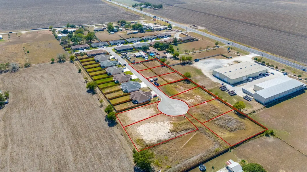 Overview of rural landscape featuring property boundaries highlighted and extensive farmland