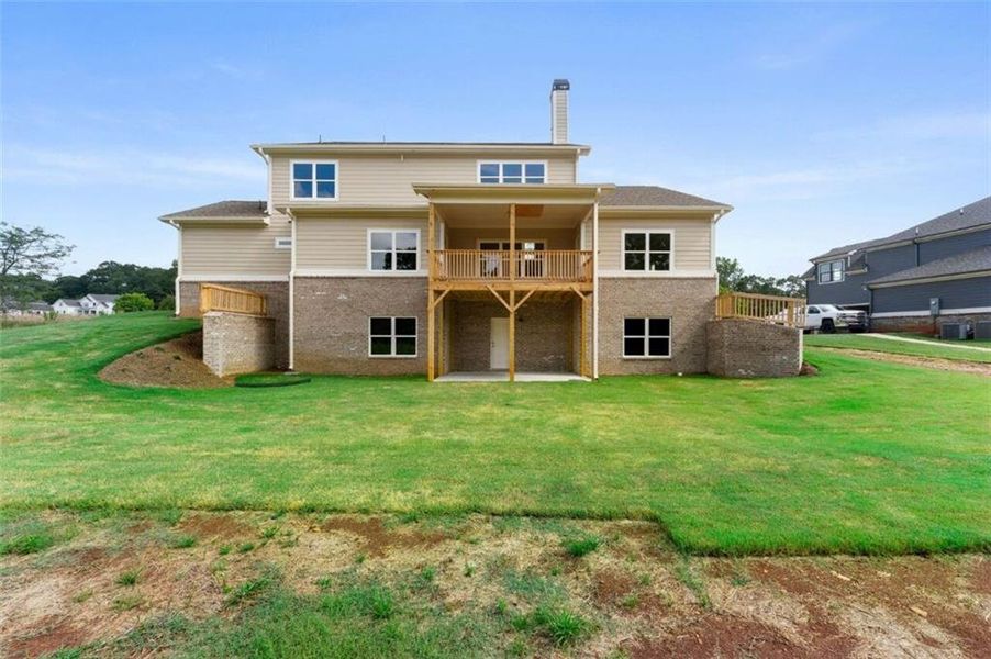 Exterior details and patio area of a home in Steeplechase, Hoschton (Image 3).