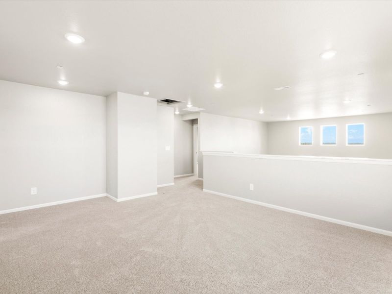 Spacious, unfurnished interior of a new home in Buffalo Highlands: The Flora Collection, Commerce City (Image 12).