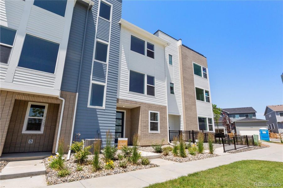 Exterior details and patio area of a home in Dillon Pointe - Skyview, Broomfield (Image 4).
