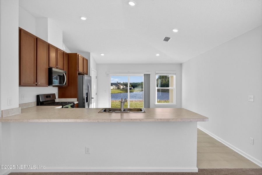 Furnished interior view inside a new home in , Palm Coast (Image 13). Furnished interior view inside a new home in , Palm Coast (Image 13).