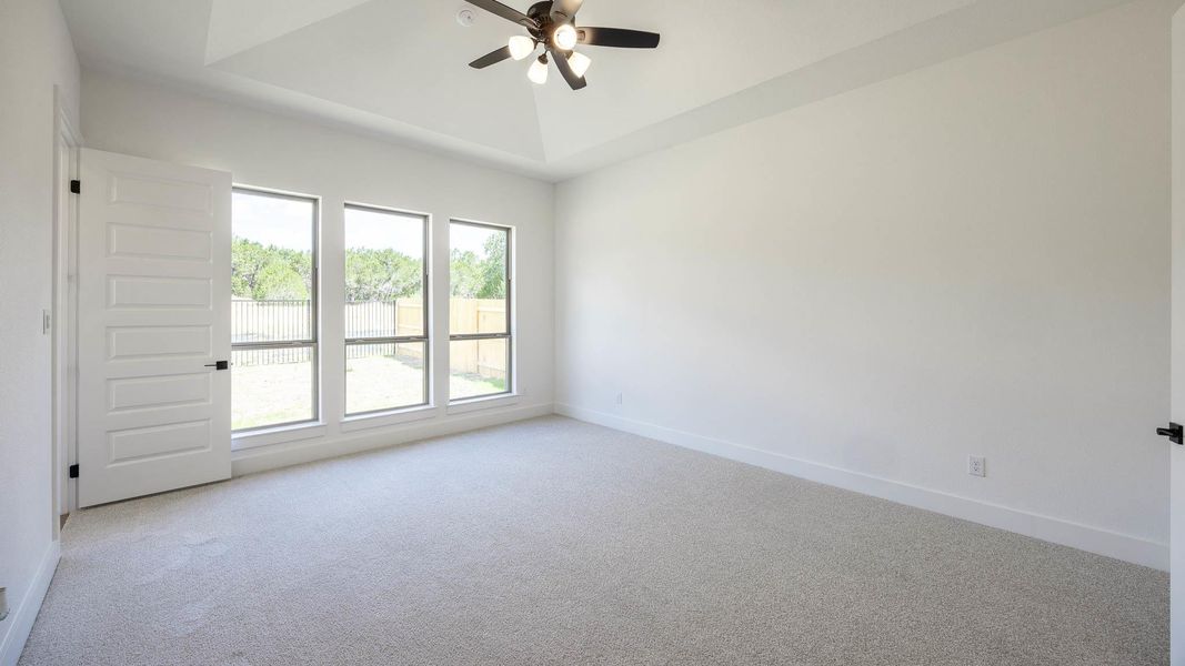Spacious, unfurnished interior of a new home in Parkside on the River West, Georgetown (Image 13).