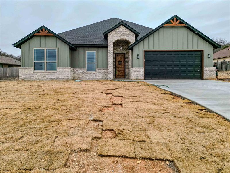 View of front of home with a garage