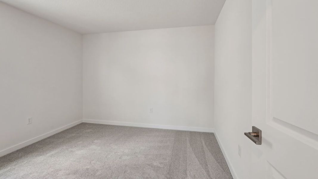 Fourth Bedroom in the Jupiter in Hamilton Bluff located in Haines City, FL.