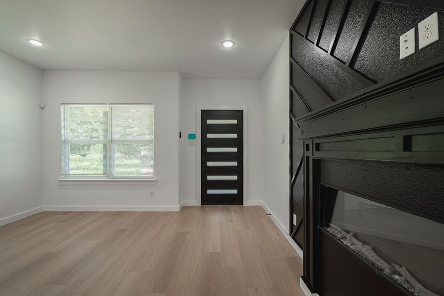 Foyer featuring light wood-style floors and recessed lighting Foyer featuring light wood-style floors and recessed lighting