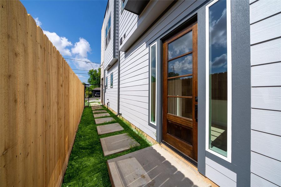Privacy fencing along the entire side of the home.