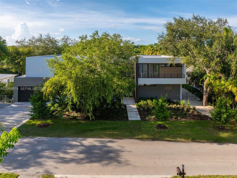 Front exterior of a new home in , South Miami, FL, highlighting curb appeal (Image 28).