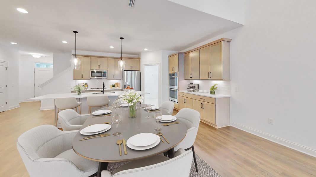 Furnished interior view inside a new home in The Courtyards at Oak Grove, Durham (Image 7).