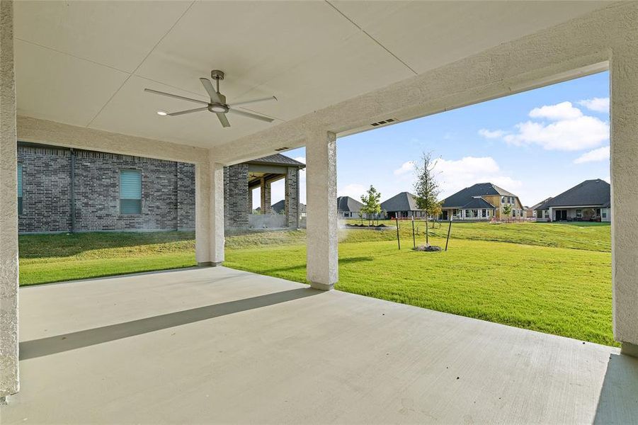 Looking to left of the covered patio. This patio has plenty of space for outdoor entertaining.