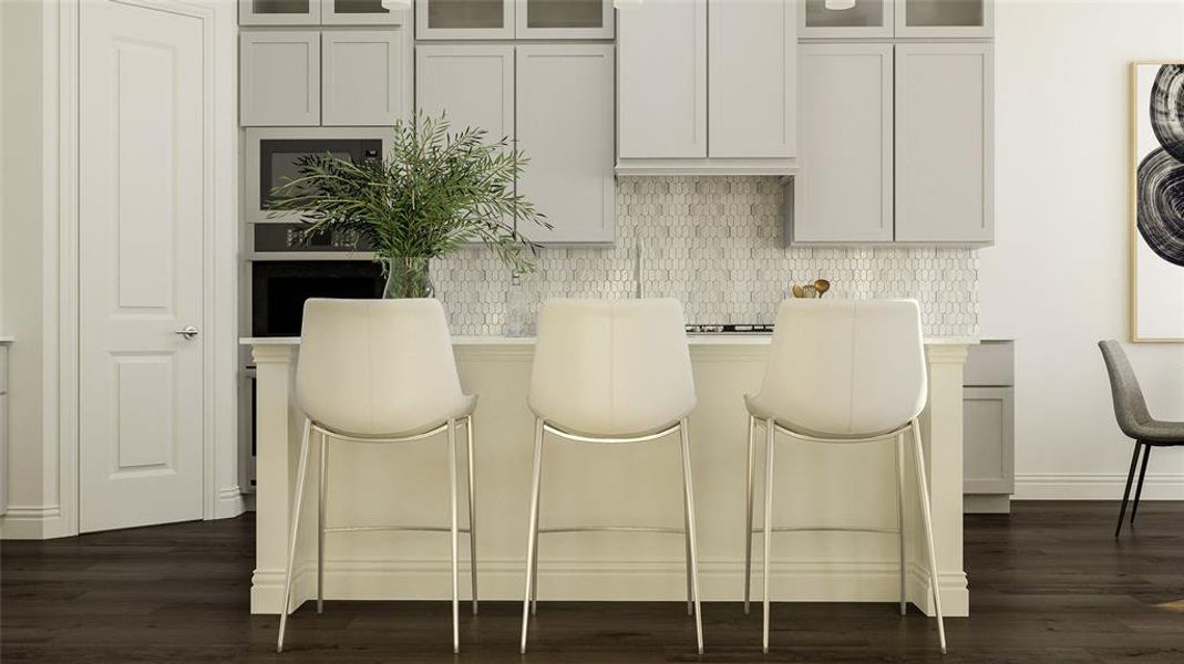 Bar featuring backsplash, white cabinets, and dark hardwood / wood-style floors