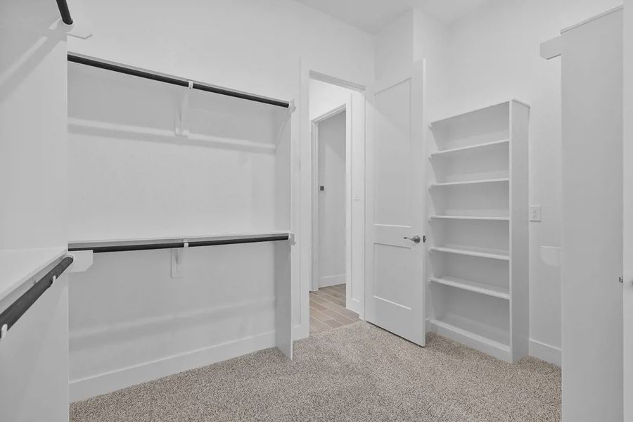 Representative furnished interior of a home built from the Brooks by Chesmar Homes in Grange, Katy (Image 13).