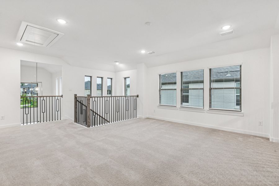 Game Room in the Picasso II home plan by Trophy Signature Homes – REPRESENTATIVE PHOTO