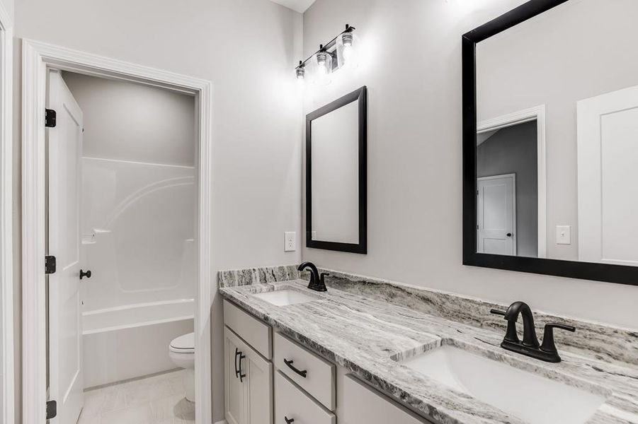 Furnished interior view inside a new home in LOVVORN ESTATES, Carrollton (Image 16).