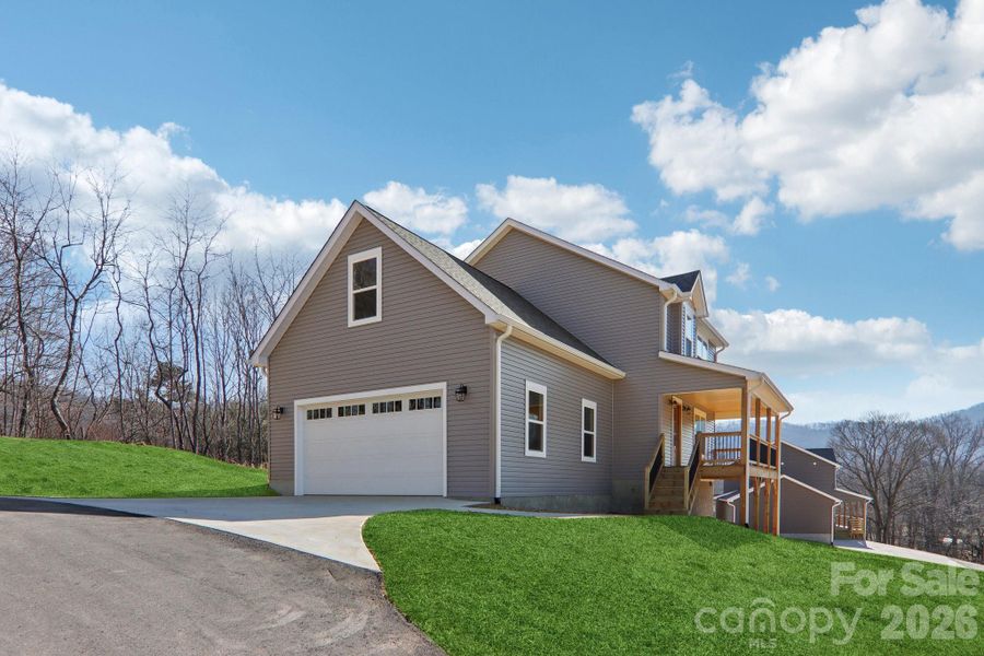 Front exterior of a new home in , Candler, NC, highlighting curb appeal (Image 22). Front exterior of a new home in , Candler, NC, highlighting curb appeal (Image 22).
